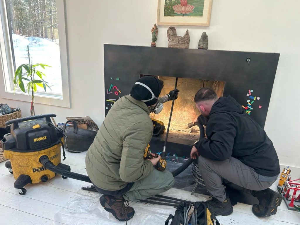 SafeFlow technician performing professional chimney cleaning at a Maryland home